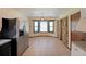 Bright kitchen with stainless steel appliances and an adjacent breakfast nook area at 999 Wiley Bridge Rd, Woodstock, GA 30188