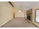 Bright living room with high ceilings, fireplace and many windows at 999 Wiley Bridge Rd, Woodstock, GA 30188