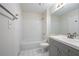 Bright bathroom with white subway tile, a tub, vanity and tiled floors at 1074 Peachtree Ne Walk # B404, Atlanta, GA 30309