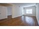 Large bedroom with wood-look flooring and lots of natural light at 1074 Peachtree Ne Walk # B404, Atlanta, GA 30309