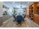 Well-appointed conference room with large table, comfortable chairs, and built-in shelving at 1074 Peachtree Ne Walk # B404, Atlanta, GA 30309