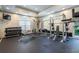 Spacious gym with weight machines, free weights, and a rubber floor at 1074 Peachtree Ne Walk # B404, Atlanta, GA 30309