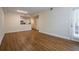 Open-concept living space with hard surface floors, recessed lighting, and access to the kitchen at 1074 Peachtree Ne Walk # B404, Atlanta, GA 30309