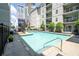 Inviting community pool with clear water, surrounded by a well-maintained condo complex at 1074 Peachtree Ne Walk # B404, Atlanta, GA 30309