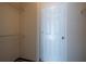 An open walk-in closet with a standard door and metal storage shelves at 1074 Peachtree Ne Walk # B404, Atlanta, GA 30309