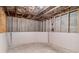 Unfinished basement with concrete foundation and exposed ceiling, ready for customization at 122 Gingers Way, Mcdonough, GA 30252