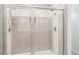 The bathroom features a tiled shower with a glass door at 122 Gingers Way, Mcdonough, GA 30252