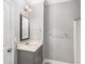Cozy bathroom features a vanity and bathtub with shower at 122 Gingers Way, Mcdonough, GA 30252