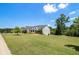 Lovely residence boasting a sprawling front yard, mature trees, and a peaceful neighborhood setting at 122 Gingers Way, Mcdonough, GA 30252