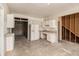 Spacious kitchen with white cabinets, ample counter space, and modern appliances being installed at 122 Gingers Way, Mcdonough, GA 30252