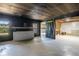 Large room with bar area and potential for customization, offering flexible living space at 122 Gingers Way, Mcdonough, GA 30252