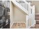 Welcoming entryway featuring a tile floor, stairs, and a stylish front door at 1482 N Crossing Ne Cir, Atlanta, GA 30329