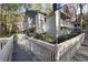Townhome exterior featuring a private balcony with wooded surroundings at 1482 N Crossing Ne Cir, Atlanta, GA 30329