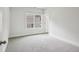 Bedroom offers neutral tones and natural light, creating a serene atmosphere at 3111 Stonegate Sw Dr, Atlanta, GA 30331