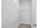 Neat walk-in closet with overhead shelving at 3111 Stonegate Sw Dr, Atlanta, GA 30331