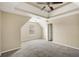 Spacious bedroom with plush carpeting and neutral paint, offering a serene retreat at 40 Wimberly Way, Covington, GA 30016