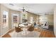 Cozy dining area with plenty of natural light and seamless transition to the living room at 40 Wimberly Way, Covington, GA 30016