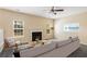 Inviting living room with fireplace and ample natural light, perfect for gatherings at 40 Wimberly Way, Covington, GA 30016