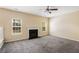 Expansive living room with a fireplace and neutral tones, ideal for personalization at 40 Wimberly Way, Covington, GA 30016