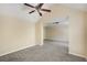 Neutral living room with ceiling fan, awaiting your personal touch and style at 40 Wimberly Way, Covington, GA 30016
