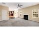 Spacious living room and adjoining kitchen and lots of windows, creating a bright and airy atmosphere at 40 Wimberly Way, Covington, GA 30016