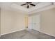 Expansive bedroom with closet, tray ceiling and ceiling fan, offering comfort and style at 40 Wimberly Way, Covington, GA 30016