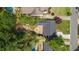 Aerial view of a home showing the roof, back yard, patio, and surrounding neighborhood at 962 Cardova Ne Dr, Atlanta, GA 30324