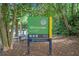 Sign for Armand Park features park information, trails, and dog park at 962 Cardova Ne Dr, Atlanta, GA 30324