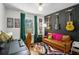 Stylish bedroom or home office with unique decor, including wall-mounted guitars and colorful accents at 962 Cardova Ne Dr, Atlanta, GA 30324