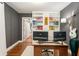 Well-appointed home office showcasing custom shelving, neutral walls, and natural light at 962 Cardova Ne Dr, Atlanta, GA 30324