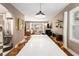 Inviting living room showcases stylish furnishings, natural light, and a seamless flow into the kitchen and dining area at 962 Cardova Ne Dr, Atlanta, GA 30324