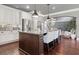 Gourmet kitchen with granite countertops, stainless steel appliances, and a large island at 161 Archstone Sq, Mcdonough, GA 30253