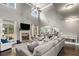 Spacious living room with vaulted ceilings, fireplace, and an open layout at 161 Archstone Sq, Mcdonough, GA 30253