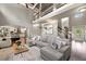 Spacious living room with vaulted ceilings, fireplace, and an open layout at 161 Archstone Sq, Mcdonough, GA 30253