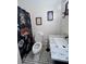 Charming bathroom with tiled floor, sleek vanity, and decorative shower curtain at 260 Manning Sw Rd # 42, Marietta, GA 30064