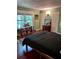 Bright bedroom with hardwood floors, large windows, and neutral wall color at 260 Manning Sw Rd # 42, Marietta, GA 30064