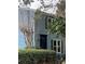 Charming home exterior showcases light blue siding and black shutters on a tree-lined street at 260 Manning Sw Rd # 42, Marietta, GA 30064