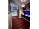 Office nook with built-in shelves, desk, hardwood flooring, and view to the kitchen at 260 Manning Sw Rd # 42, Marietta, GA 30064