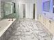 Luxurious bathroom featuring marble floors, double vanities, and a glass shower at 4345 Park Brooke Trce, Alpharetta, GA 30022