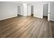Spacious main bedroom featuring neutral colors, ensuite, and double closets at 4345 Park Brooke Trce, Alpharetta, GA 30022