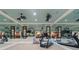 Mirrored exercise room featuring exercise equipment and multiple ceiling fans at 4375 Mount Paran Pkwy Nw, Atlanta, GA 30327