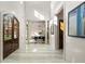 Bright foyer with marble floors, soaring ceilings, and elegant columns leading to the dining area at 4375 Mount Paran Pkwy Nw, Atlanta, GA 30327