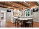 Gorgeous open kitchen with marble countertop island, state-of-the-art appliances, and wooden beams at 4375 Mount Paran Pkwy Nw, Atlanta, GA 30327