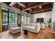 Bright and airy living room with french doors, hardwood floors and comfortable seating at 4375 Mount Paran Pkwy Nw, Atlanta, GA 30327