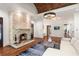 Sophisticated living room with stone fireplace, hardwood floors and stylish furnishings at 4375 Mount Paran Pkwy Nw, Atlanta, GA 30327