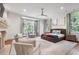 Bright and spacious main bedroom features large windows, hardwood floors, and stylish furnishings at 4375 Mount Paran Pkwy Nw, Atlanta, GA 30327