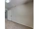 Neutral bedroom with plush carpeting, neutral walls, and a closet at 516 N Shore Rd, Lithonia, GA 30058
