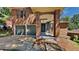 Charming two-story brick home featuring an attached two-car garage and a welcoming front entrance at 516 N Shore Rd, Lithonia, GA 30058