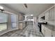 Bright kitchen featuring granite counters, stainless steel appliances, and ample cabinet space at 516 N Shore Rd, Lithonia, GA 30058