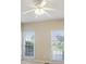 Bedroom with ceiling fan, two large windows and neutral walls at 980 Ector Chase Nw, Kennesaw, GA 30152